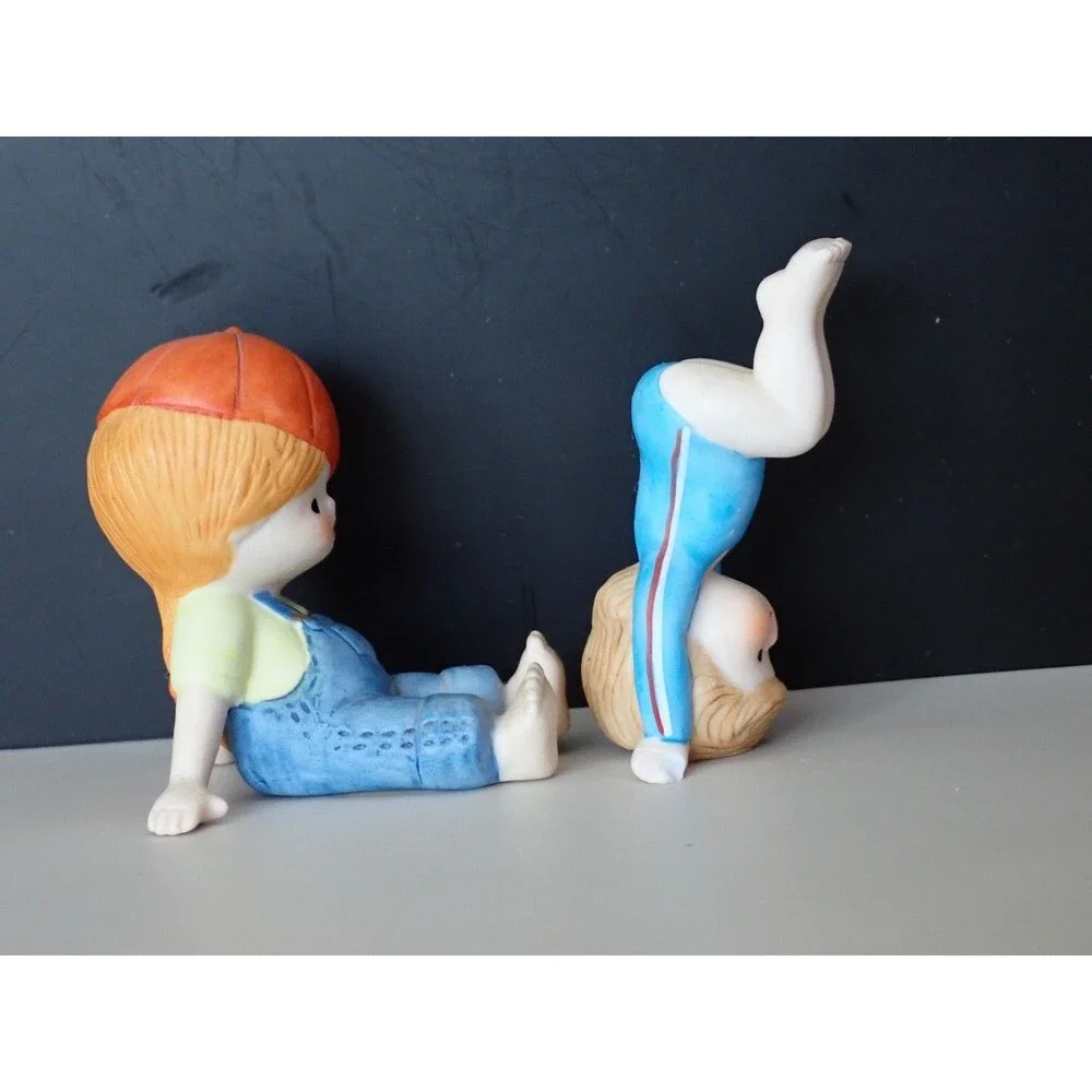 ENESCO Boy & Girl Playing Porcelain Figurine Bisque Set of 2 Vintage 1981 & 1983